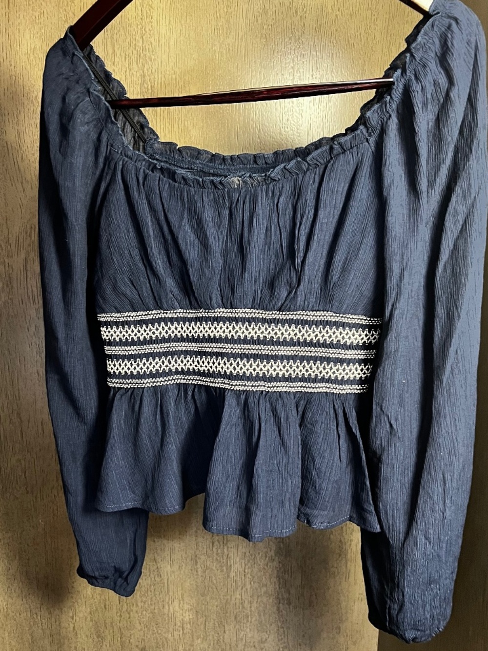 Francesca’s Medium navy ruched blouse with ruffle neck and embroidered waistband